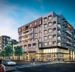 Modern multi-story apartment building with large windows and balconies, street-level shops, people walking on sidewalks, and cars at an intersection in the evening, with trees and streetlights along the road.