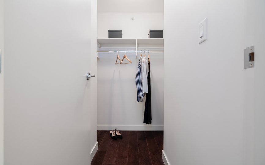 walk in closet at level seymour one bedroom suite