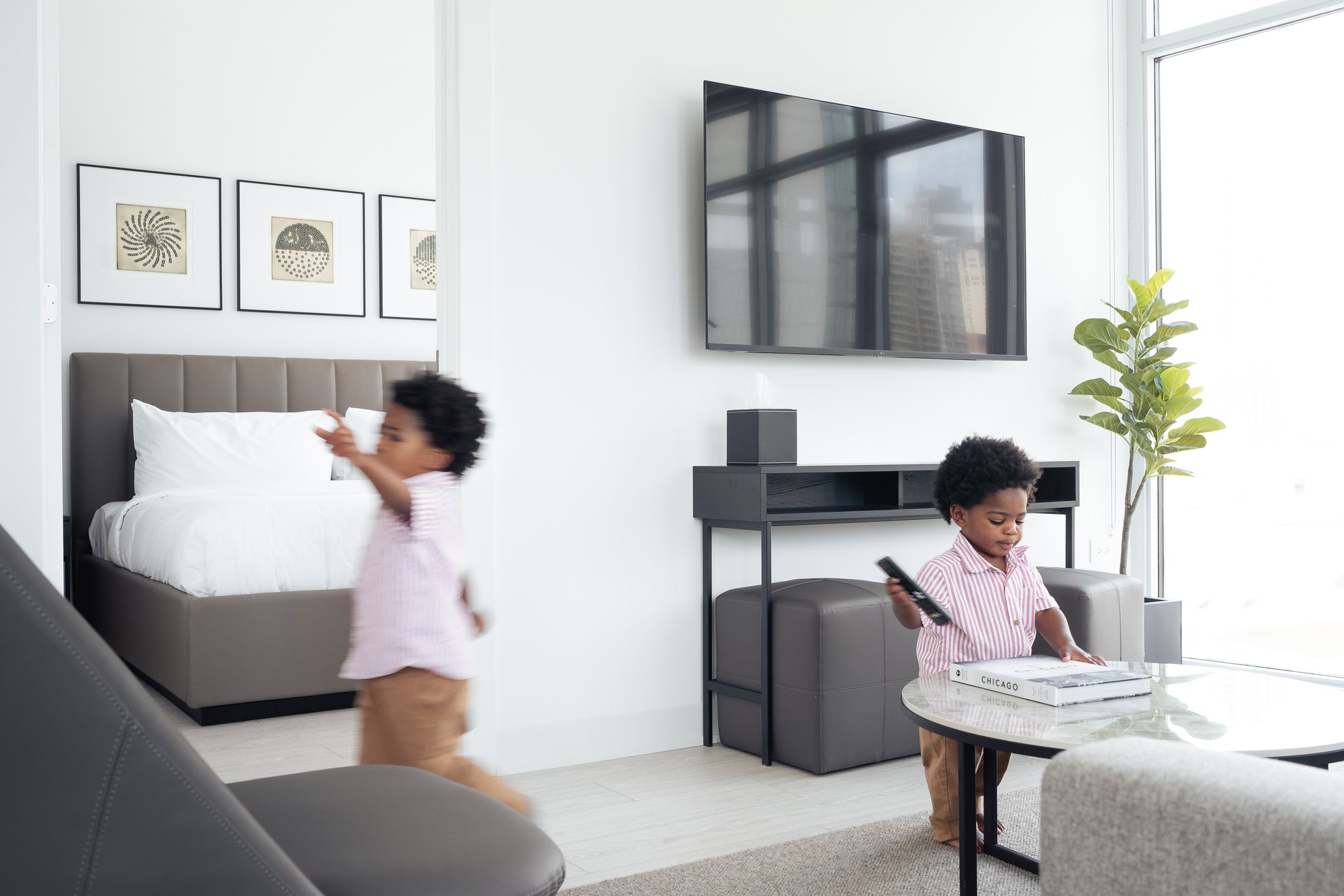 two little boys playing the living room