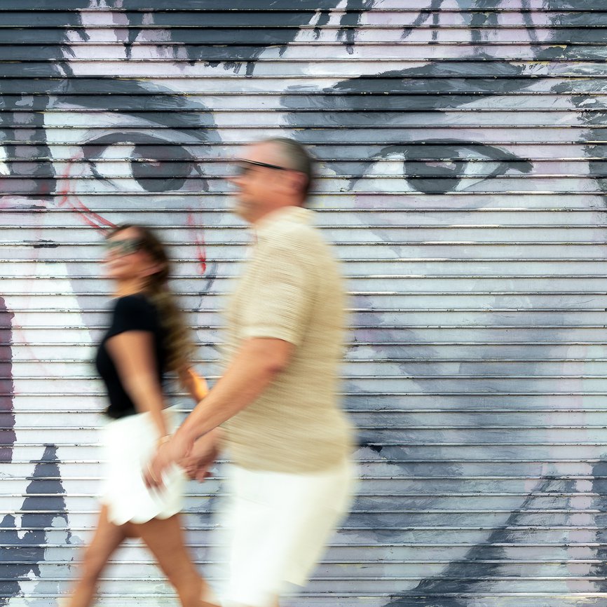 couple walking through downtown los angeles arts district