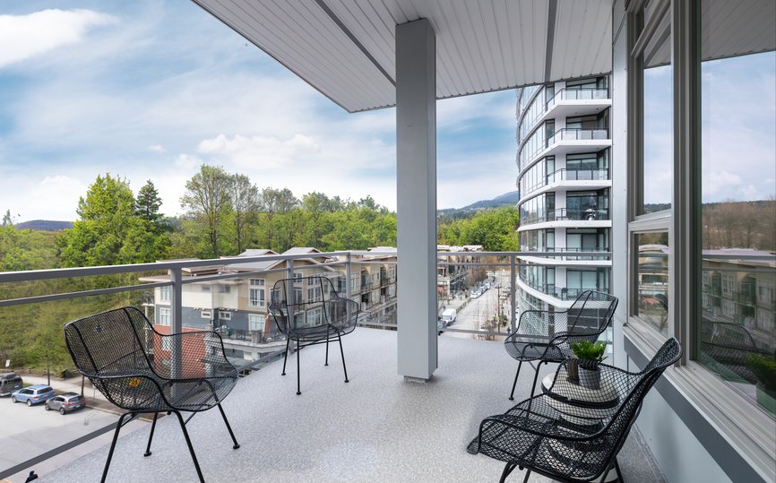 big balcony overlooking port moody city in furnished two bedroom suite at level hotels and furnished suites