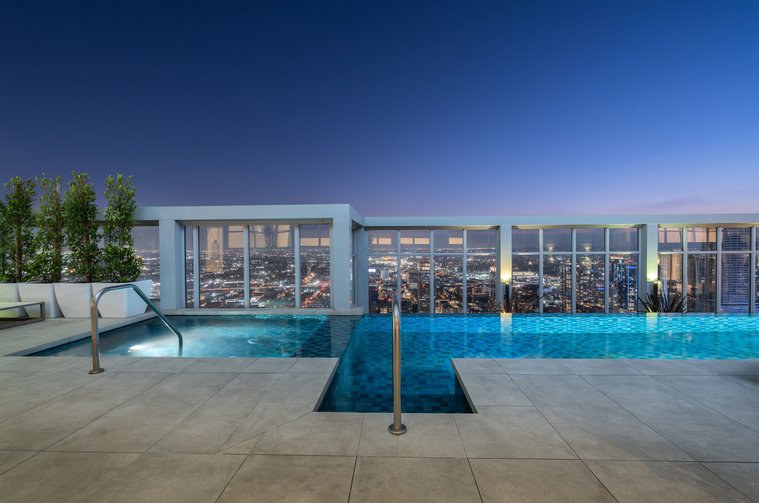 downtown los angeles view from private rooftop patio pool at level penthouse south hill dtla