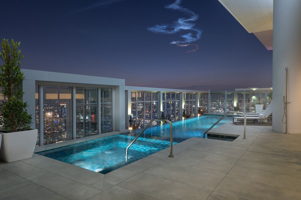 level penthouse south hill featuring rooftop pool with downtown los angeles view