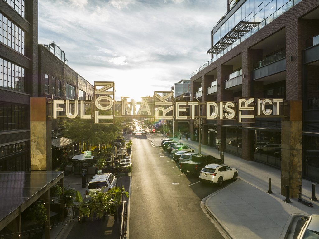 View of Chicago's Fulton Street and Fulton Market sign at dusk