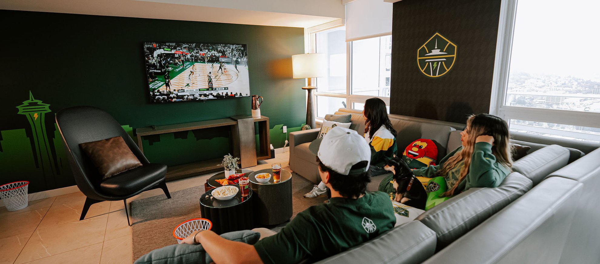 Seattle Storm Fan Suite - Living room with people
