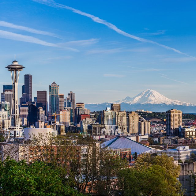 seattle landscape with the background of space needle and mountain