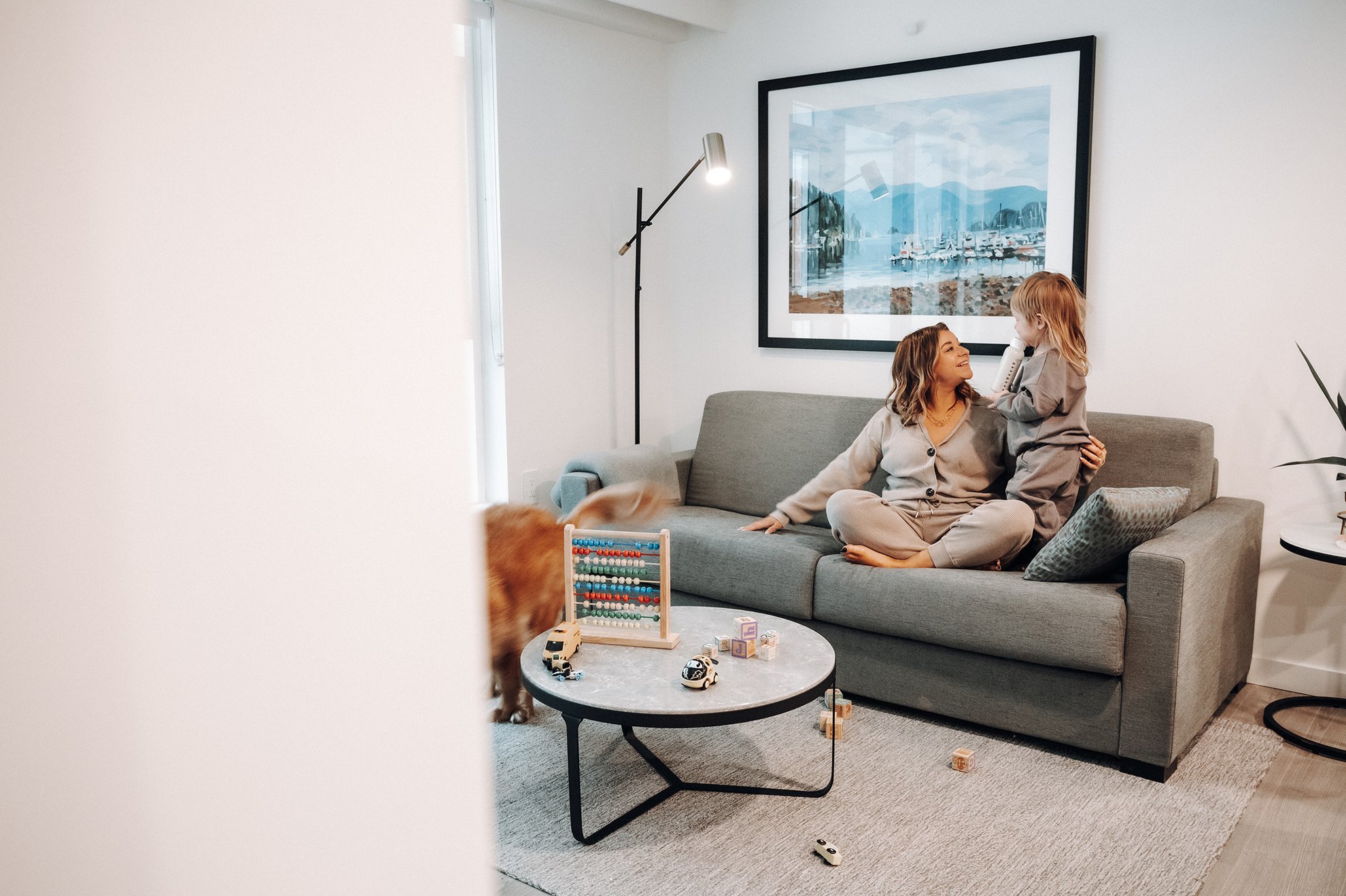 A mother and daughter sharing an intimate moment in the living room