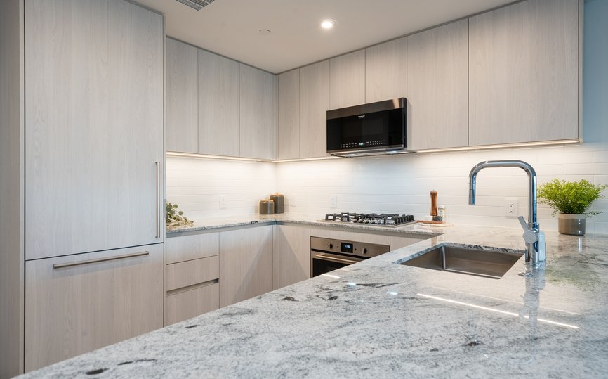 fully equipped kitchen with stainless steel appliances at level hollywood los angeles