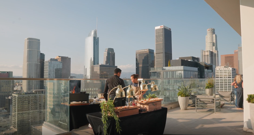 catering service on the balcony of the south olive penthouse at level la_dusk