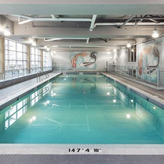 indoor pool with hot tub at level richmond furnished suites