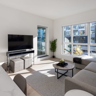 spacious living area feature sofa bed in deluxe two bedroom suite at level richmond